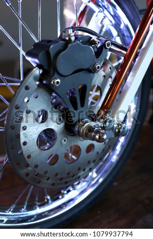 Close up modern superbike disc break & wheel detail