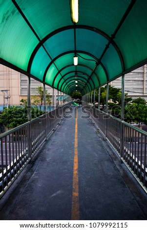 A symmetry alloy steel pedestrian overpass in Bangkok, Thailand.