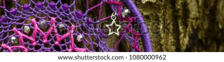 Banner of Dream catcher with feathers threads and beads rope hanging. Dreamcatcher handmade