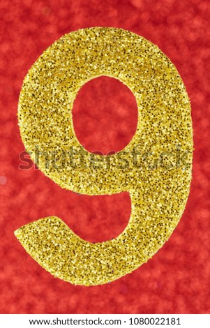 Number nine gold color over a red background. Anniversary. Vertical