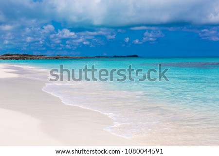Beautiful beach with white sand and turquoise water.  Summer vacation travel holiday background concept.Luxury travel summer holiday background concept.