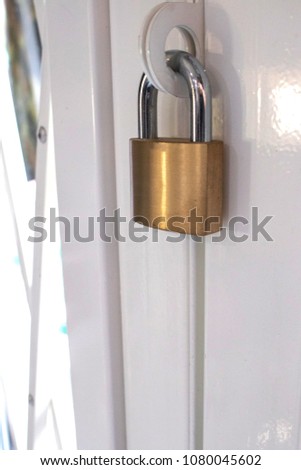 old key lock yellow white background