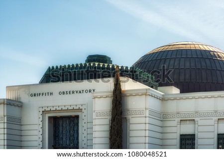 Los Angeles, CA, USA - February 02, 2018: The logo of Griffith Observatory at the entrance of the legendary building and famous tourist attraction
