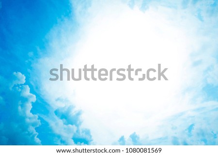 photo with cloud on bright blue sky background. Free space for text