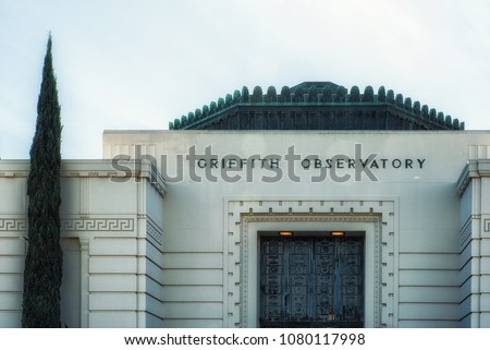 Los Angeles, CA, USA - February 02, 2018: The logo of Griffith Observatory at the entrance of the legendary building and famous tourist attraction