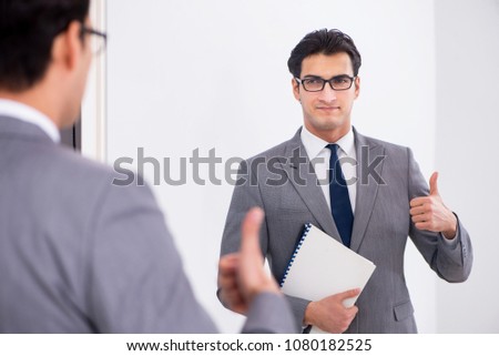 Politician planning speach in front of mirror Royalty-Free Stock Photo #1080182525
