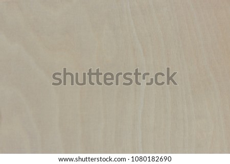 Wooden pattern in the background.