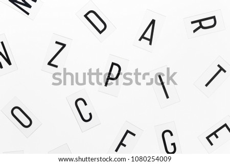 black lightbox letters over white background