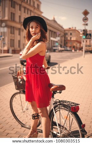 Woman with bike portrait