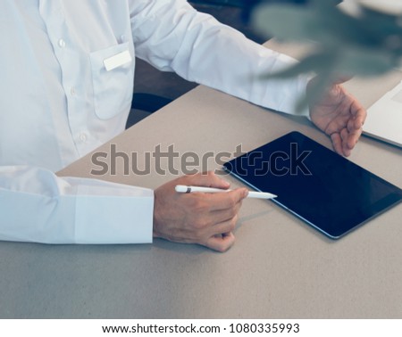 arab business man writing on tablet