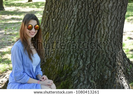 beautiful portrait of a girl in sunglasses,