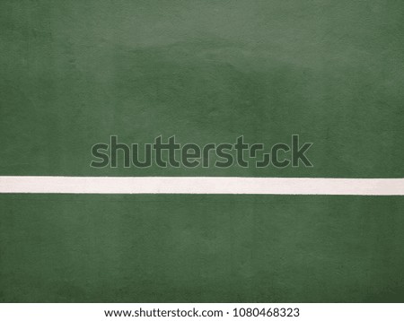 Green pastel wall with white horizontal bar is minimal style and texture patterns