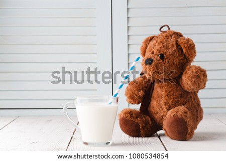Teddy bear love milk, kid breakfast concept