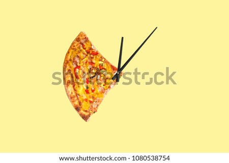 Creative pizza picture in the form of a clock with arrows on a yellow bright background. Concept