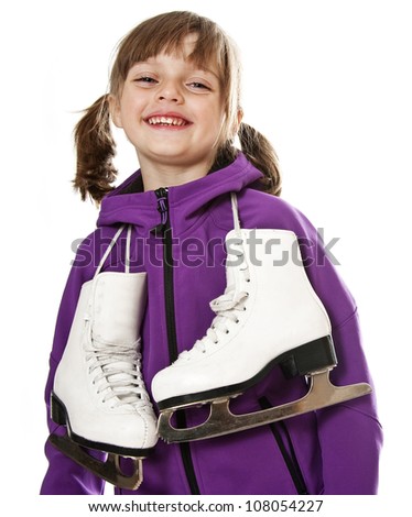 happy little girl holding ice skates on white background