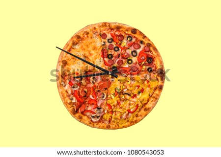 Creative pizza picture in the form of a clock with arrows on a yellow background.  Concept