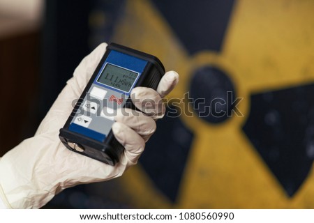 Measurements of radiation. Sign of radiation on a background Royalty-Free Stock Photo #1080560990