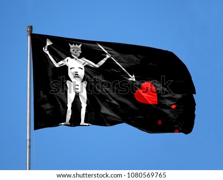 Blackbeard Pirate Flag on a flagpole
