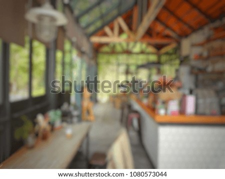 Blurry image coffee shop with sunlight of summer