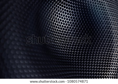 Black corrugated metal mesh, speaker membrane cover, spherical 3D shape, background or backdrop texture  