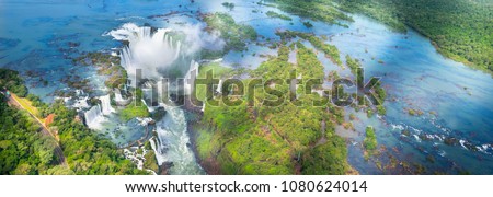 Beautiful panoramic view of Iguazu Falls from the helicopter ride, one of the Seven Natural Wonders of the World - Foz do Iguaçu, Brazil Royalty-Free Stock Photo #1080624014