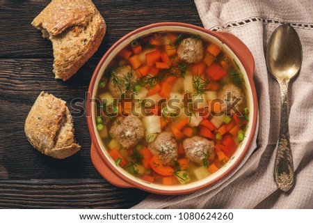 Healthy vegetable soup with meatballs.