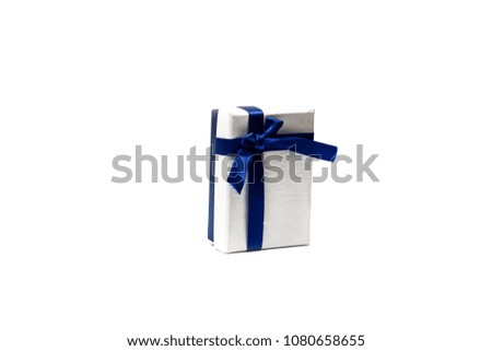 White gift box with blue ribbon on white background, isolate