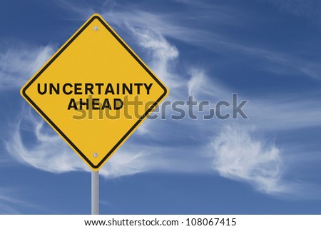 Road sign indicating uncertainty ahead against a dramatic sky background Royalty-Free Stock Photo #108067415