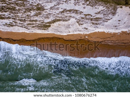 Waves crashing against White Cliffs