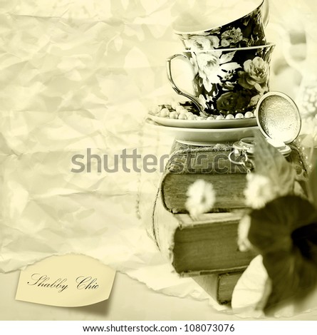 Romantic Shabby chic background with Old Books , pocket watch and cups