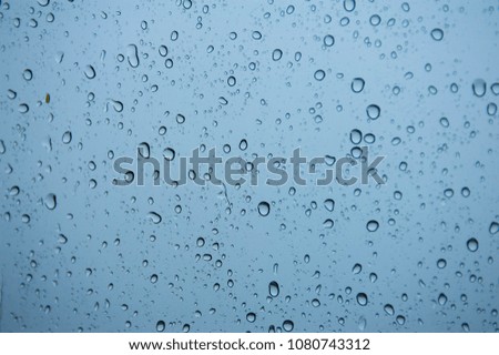 Water droplets on blue background,selective focus,blurry image