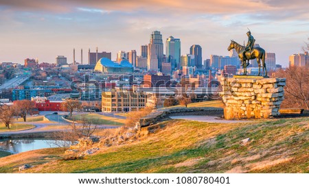The Scout overlooking(108 years old statue) in downtown Kansas City. It was conceived in 1910  Royalty-Free Stock Photo #1080780401