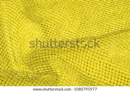 Yellow silver mesh fabric, with a woven metallic thread. Bring it back in the 1920s with this extravagant silvery and black geometric yellow mesh. Grab it while he's still here,