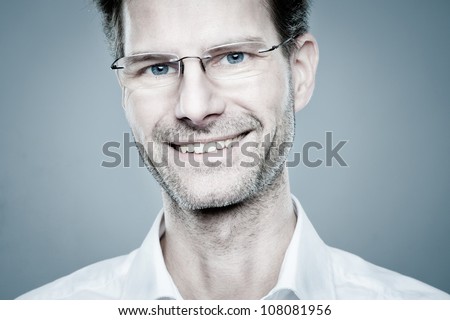 Portrait from a happy and smiling man