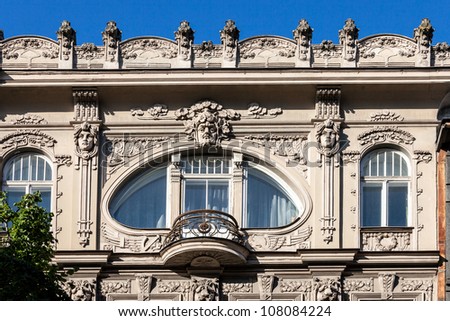 Fragment of Art Nouveau architecture style of Riga city Royalty-Free Stock Photo #108084224