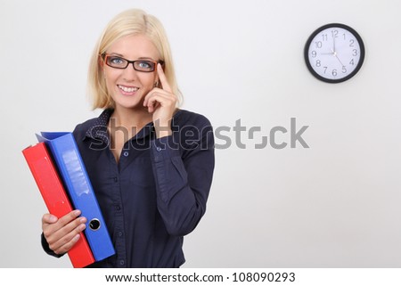 young successful businesswoman with folders
