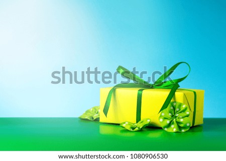Bright yellow gift for the child on his birthday