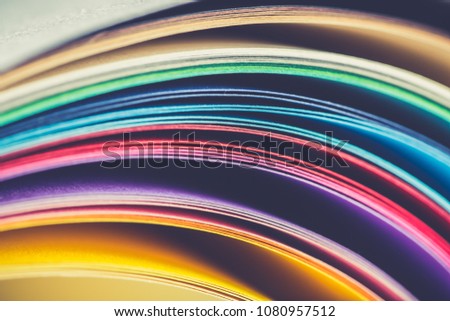 macro image of colorful curved sheets of papermacro image of colorful curved sheets of paper
