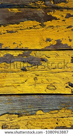 Old yellow painted fence
