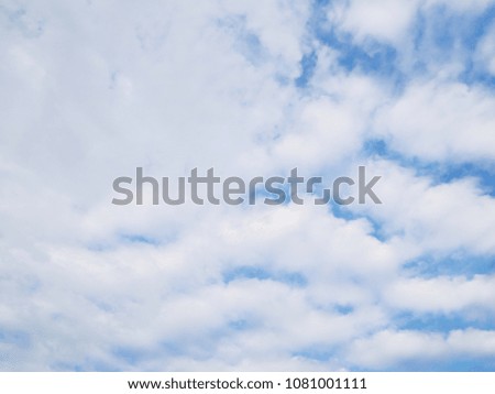 background of blue sky with white clouds