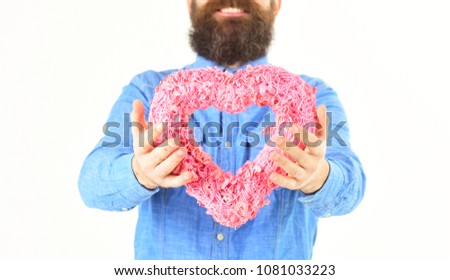 handsome beard man with Valentine Heart in hand isolated on white background