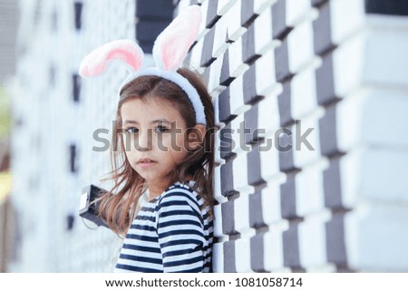 portrait of a lovely girl with bunny ears