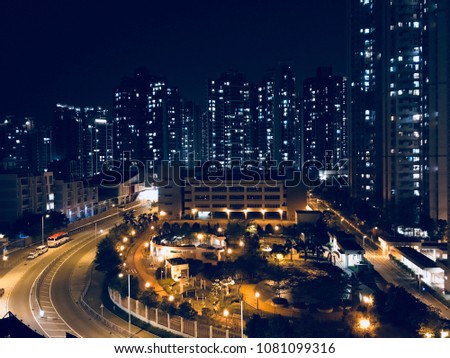 Photo shoot from a housing estate in April 2018 in Hong Kong. School and park in front of the camera. Night view and scene is breath taking. Light in blue and yellow is a perfect match.