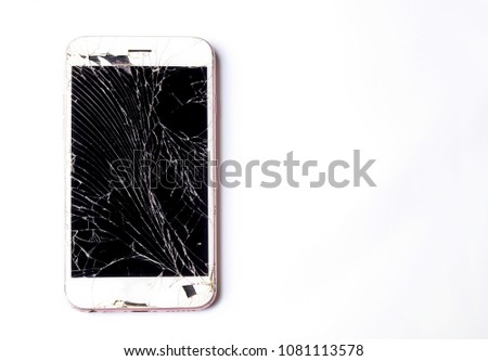 Smartphone with broken screen isolated on white background