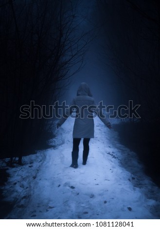 lost lonely woman silhouette in hazy forest in horror Atmosphere