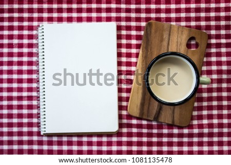 Rustic Mockup. Coffee, notebook and cutting board   on a red & white textile