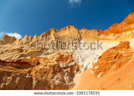 Beautiful red sand dune and sand formation  in different colors. Mui Ne .Vietnam
