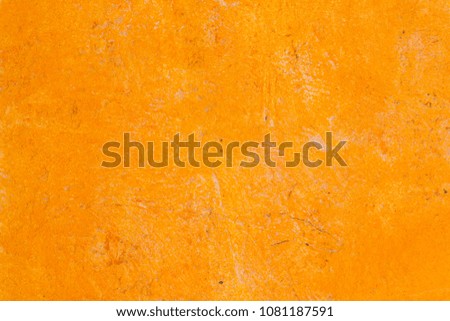Orange cement surface, abstract pattern, the background can be used as screen saver, wall paper or background with copy space.