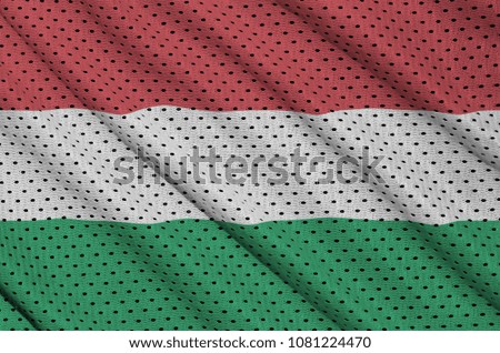 Hungary flag printed on a polyester nylon sportswear mesh fabric with some folds