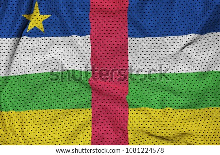 Central African Republic flag printed on a polyester nylon sportswear mesh fabric with some folds